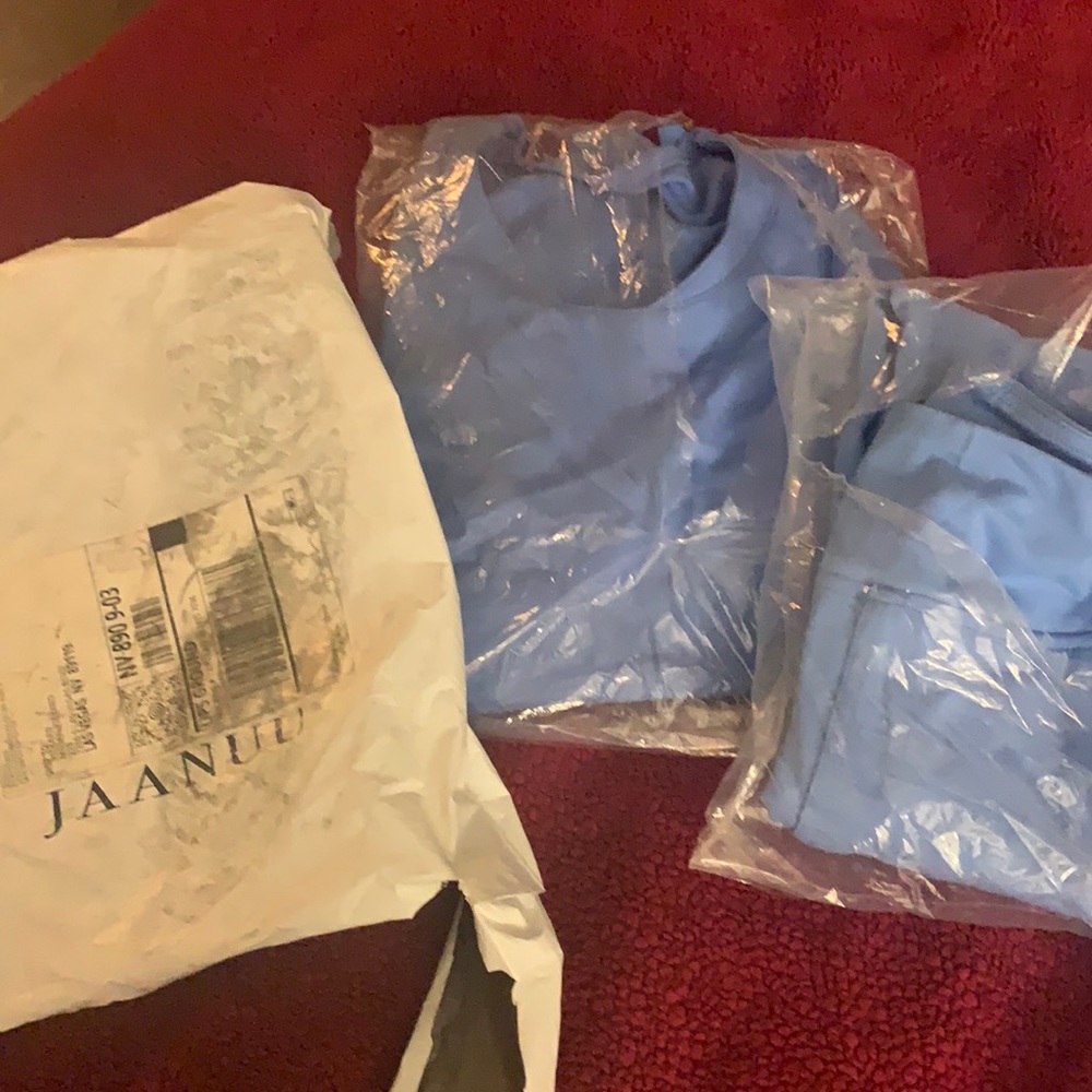 Jaanuu Ceil Blue scrub set! Size Medium 65% Rayon 30% Nylon 5% Spandex.